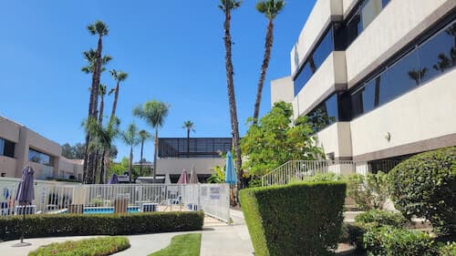 Exterior of building with palm trees