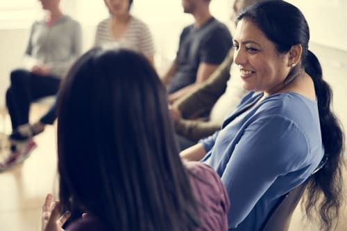 patients in a 12 step group meeting