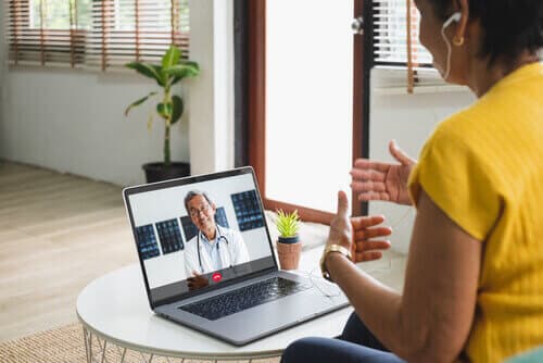 patient receiving addiction treatment via telehealth